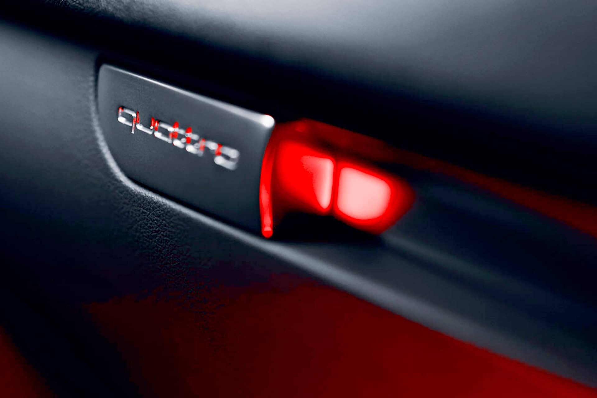 GORT illuminated car interior badge with red ambient lighting and sleek design.